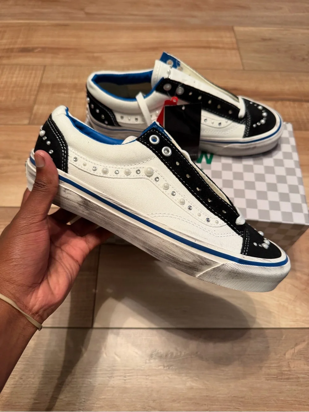 Vans White & Black Studded Low-Top Skate Sneaker with Blue Trim